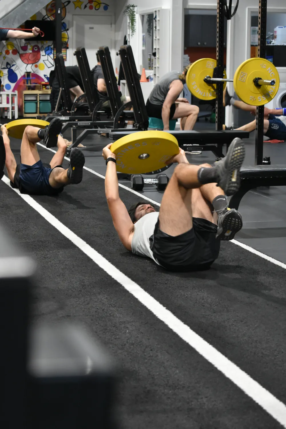 Members training together on the ANT floor