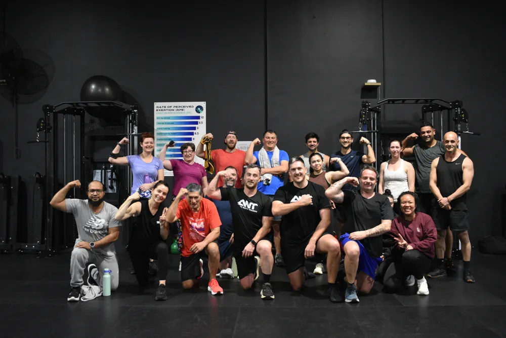 ANT members and coaches together on the gym floor